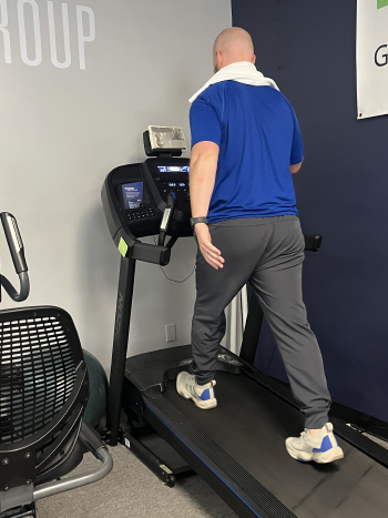 Patient walking on a treadmill during physical therapy rehabilitation at Adler Therapy Group Virginia Beach Newtown