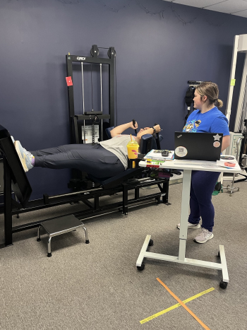 Physical therapist working with patient to improve joint mobility and restore function in Virginia Beach Newtown