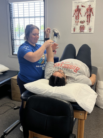 Patient performing rehabilitation exercises with a physical therapist in Virginia Beach Newtown