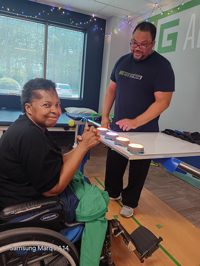 Marquis Jordan, PT, DPT, providing hands-on physical therapy treatment at Adler Therapy Group in Hampton, Virginia.